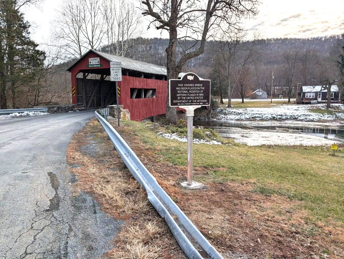 Rice Covered Bridge with the Pomeroy Foundation historic marker in the foreground, Perry County, Pennsylvania